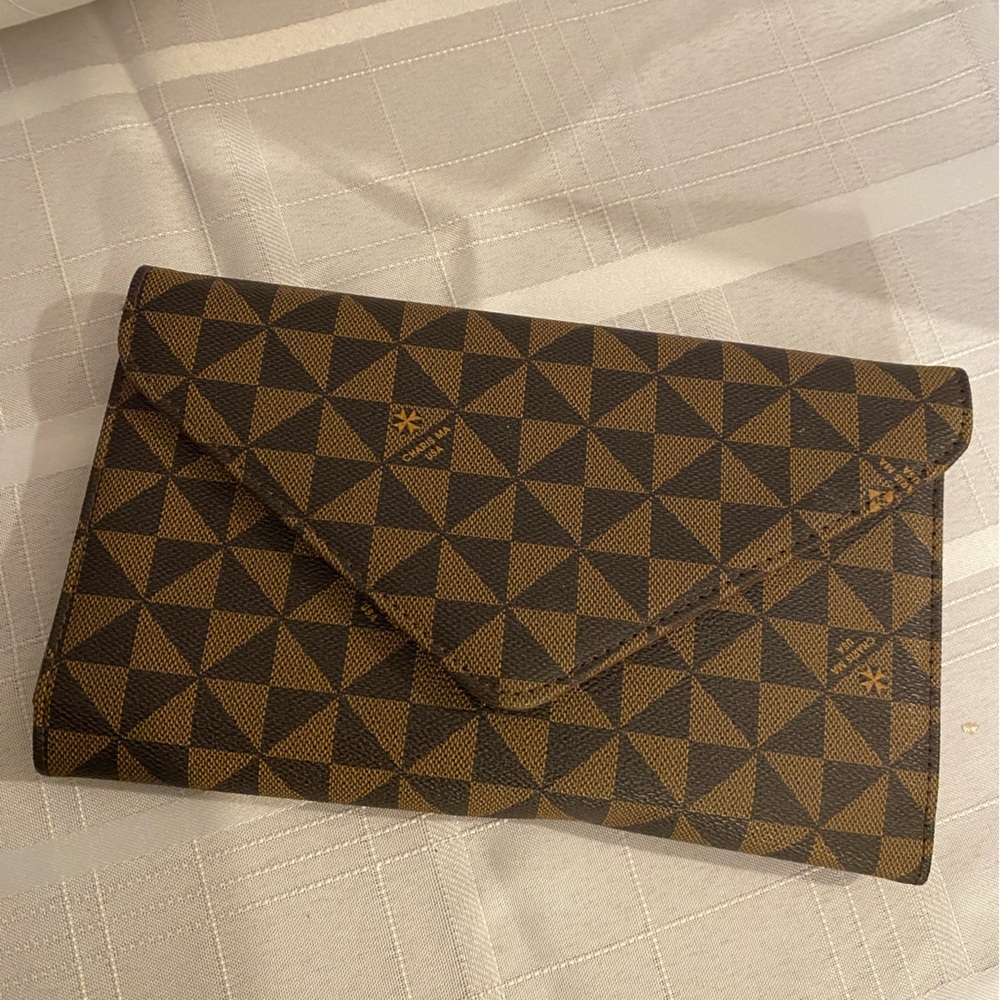Mezon monogrammed envelope clutch. Vegan leather. New. Never used.